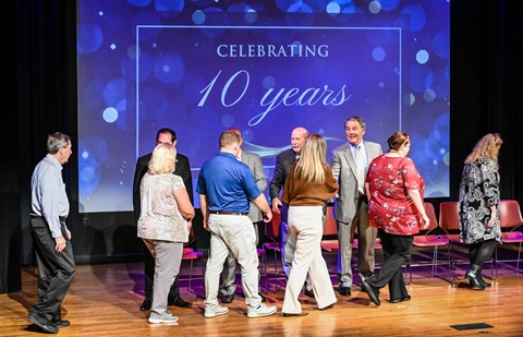 10-year honorees shake hands with Cabarrus Commissioners.jpg